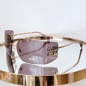 Miu Miu Rimless Sunglasses with Mauve Lenses and Gold Temples